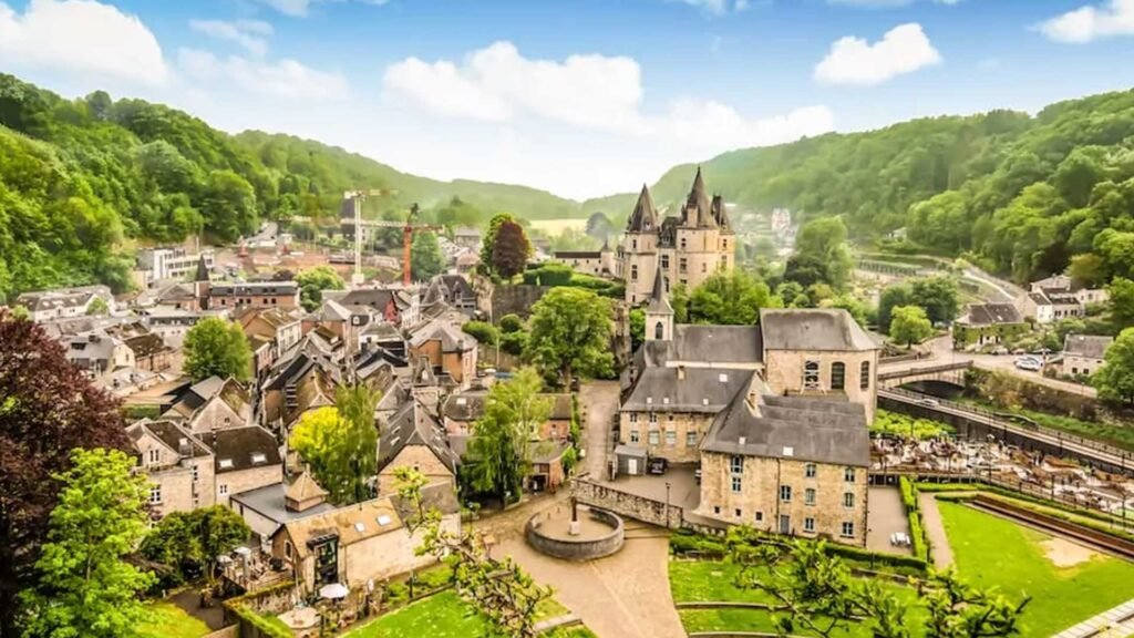 # Durbuy – Belgium's Smallest City with Big Charm Nestled in the heart of the Ardennes region, Durbuy is often called "the smallest city in the world." Despite its modest size, this enchanting destination offers visitors a perfect combination of medieval charm, natural beauty, outdoor adventures, and authentic Belgian hospitality. With its cobblestone streets, stone houses, riverside setting, and picturesque countryside, Durbuy feels like a place frozen in time, making it one of Belgium's most beloved destinations. ## The Smallest City in the World Durbuy earned its city status centuries ago and proudly maintains its reputation as one of the smallest cities on Earth. Although compact, the city is rich in history and character. Visitors can easily explore its charming streets on foot, discovering hidden corners, historic buildings, and beautiful views at every turn. Its intimate atmosphere is one of its greatest attractions. ## A Fairytale Medieval Town Walking through Durbuy feels like stepping into a storybook. The historic center features: * Cobblestone streets * Stone cottages * Flower-filled alleyways * Historic buildings * Cozy cafés * Charming boutiques The beautifully preserved architecture creates a magical atmosphere that attracts visitors throughout the year. ## Surrounded by the Ardennes Durbuy is located in the stunning Ardennes region, one of Belgium's most scenic landscapes. Rolling hills, dense forests, rivers, and valleys surround the town, making it a paradise for outdoor enthusiasts and nature lovers. The combination of medieval charm and natural beauty makes Durbuy a truly unique destination. ## The Beautiful Ourthe River Flowing through the region, the Ourthe River adds to Durbuy's picturesque setting. Visitors can enjoy riverside walks, scenic viewpoints, and various water-based activities while taking in the peaceful surroundings. The river creates countless opportunities for photography and relaxation. ## Outdoor Adventure in Every Season Durbuy is one of Belgium's top destinations for outdoor activities. Popular experiences include: * Hiking * Cycling * Kayaking * Mountain biking * Rock climbing * Fishing * Nature walks The surrounding Ardennes landscape offers adventures for visitors of all ages and abilities. ## Explore Durbuy Castle The impressive Durbuy Castle overlooks the town and serves as one of its most recognizable landmarks. Although privately owned, the castle's exterior and surrounding grounds add to the city's historic atmosphere and provide excellent photo opportunities. Its presence reinforces Durbuy's medieval character. ## Belgian Gastronomy at Its Best Durbuy is known for its excellent restaurants and local cuisine. Visitors can enjoy: * Belgian specialties * Ardennes ham * Local cheeses * Regional beers * Traditional desserts * Gourmet dining experiences Many restaurants focus on locally sourced ingredients, offering authentic flavors from the Ardennes region. ## Topiary Park – A Unique Attraction One of Durbuy's most unusual attractions is the Topiary Park. This beautifully maintained garden contains hundreds of sculpted shrubs and hedges shaped into animals, people, and artistic designs. The park offers a relaxing and family-friendly experience in the heart of the city. ## Perfect for a Weekend Escape Durbuy's peaceful atmosphere makes it an ideal destination for a short getaway. Visitors can spend their days exploring medieval streets, enjoying local food, hiking through the Ardennes, and relaxing in one of Belgium's most picturesque settings. The city's small size allows travelers to slow down and fully appreciate its charm. ## Stay Connected While Exploring Belgium Whether you're hiking in the Ardennes, sharing photos of medieval streets, enjoying Belgian cuisine, working remotely from a local café, or traveling through Europe in your motorhome, reliable mobile internet helps you stay connected throughout your journey. ## Why Durbuy Is One of Belgium's Hidden Treasures Durbuy combines everything travelers love about Belgium: history, culture, nature, gastronomy, and charm. Its medieval streets, scenic surroundings, and welcoming atmosphere create an unforgettable experience that feels far removed from modern city life. For visitors seeking a peaceful and authentic Belgian destination, Durbuy is truly one of the country's hidden gems.