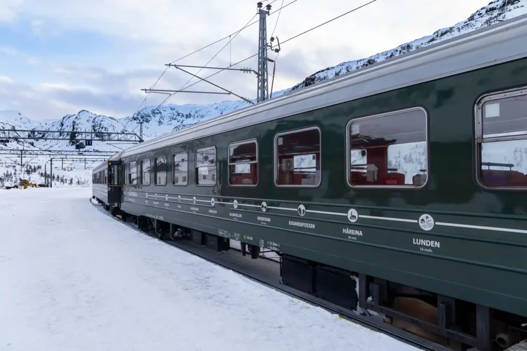 Flåm – Norway’s Fjord Village Surrounded by Waterfalls and Mountain Peaks