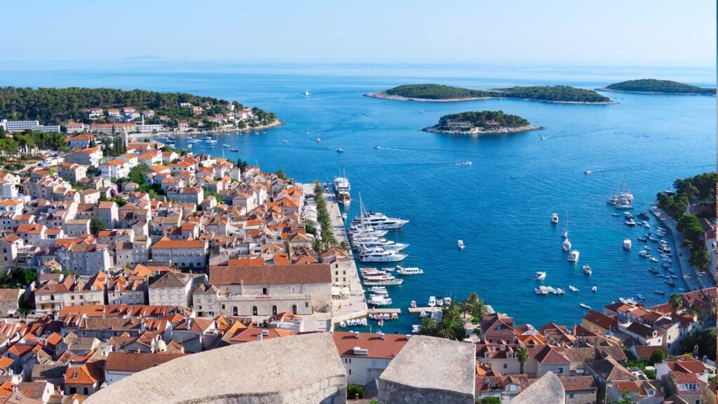 Explore Hvar Island's stunning beaches, historic harbor, and crystal-clear Adriatic waters. Stay connected on your Croatian adventure with Roam Pass Europe.